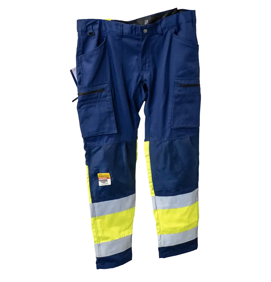 Blåkläder arbejdsbukser i mørkeblå og neongul med reflekser og lommer til knæpuder til professionelle håndværkere. Personlig sikkerhedsudstyr.
